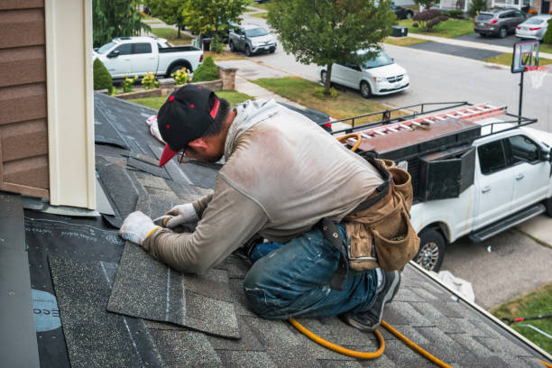 Professional Roofing technician working in Haledon, NJ